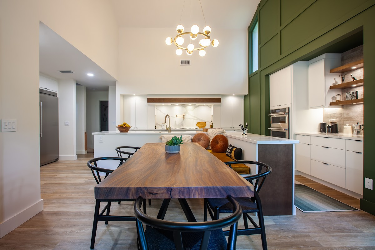 Open Space White Kitchen with accent green wall