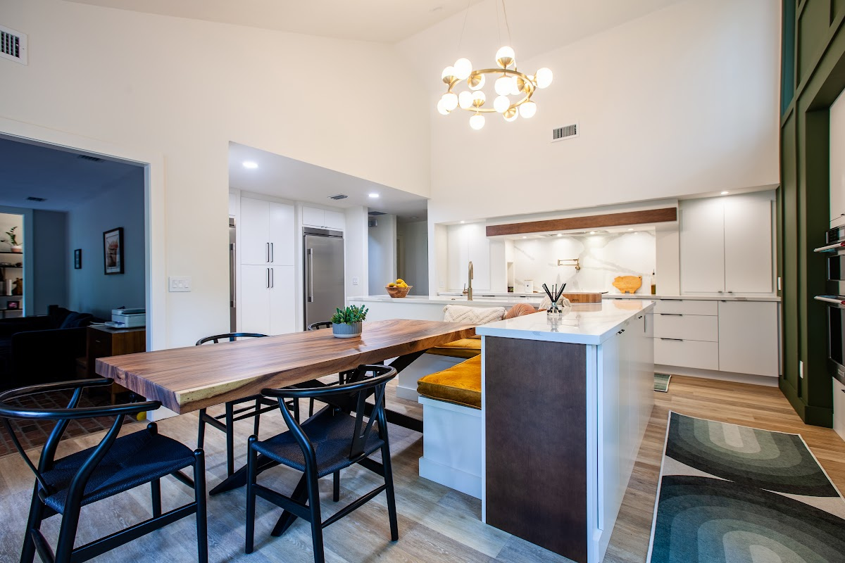 Open Space White Kitchen with accent green wall