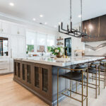 White kitchen with Cherry Rockport island