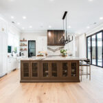 White kitchen with Cherry Rockport island