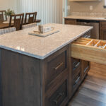 Kitchen island with silverware organizer in drawer