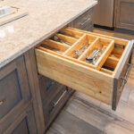 Kitchen island with silverware organizer in drawer