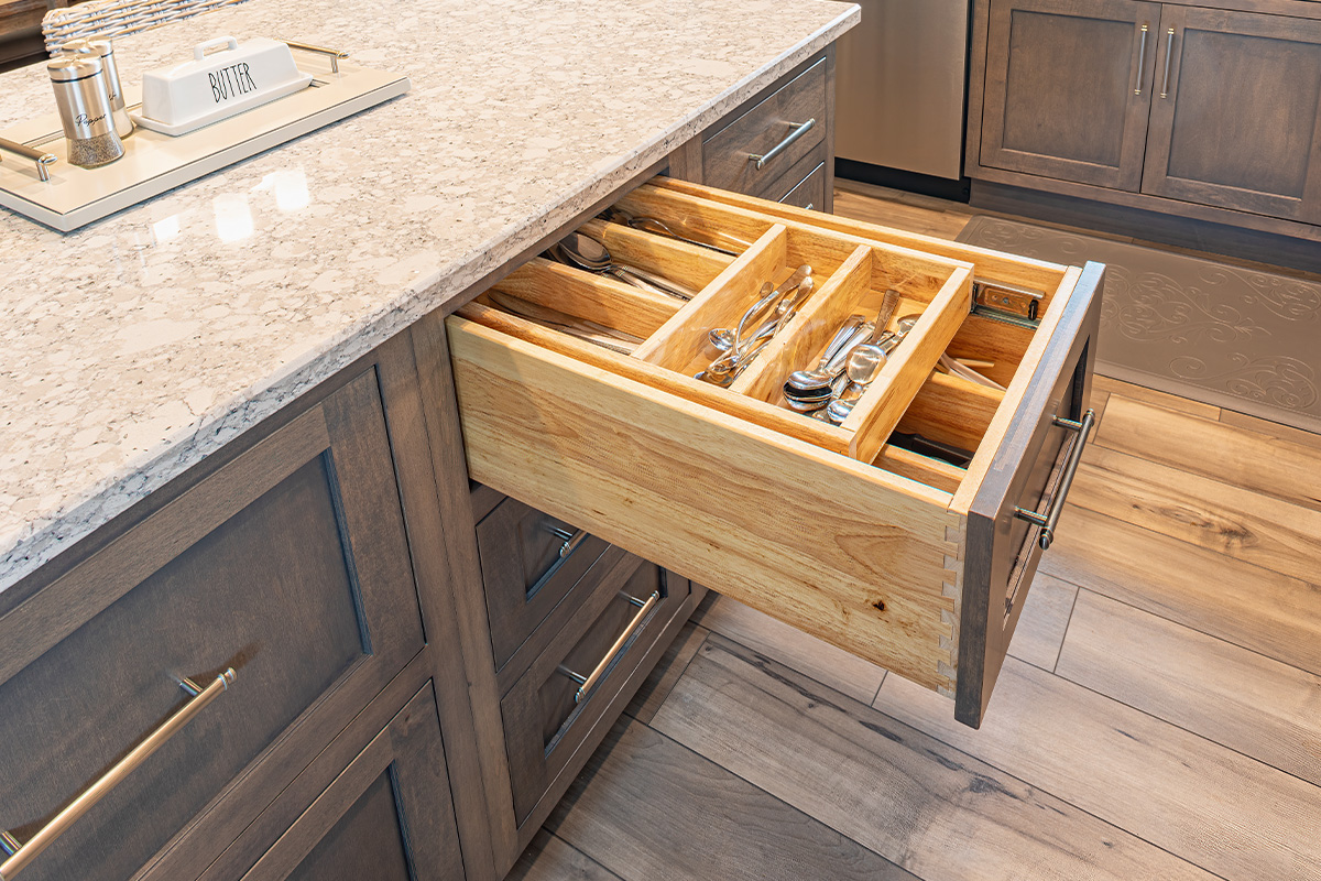 Kitchen island with silverware organizer in drawer