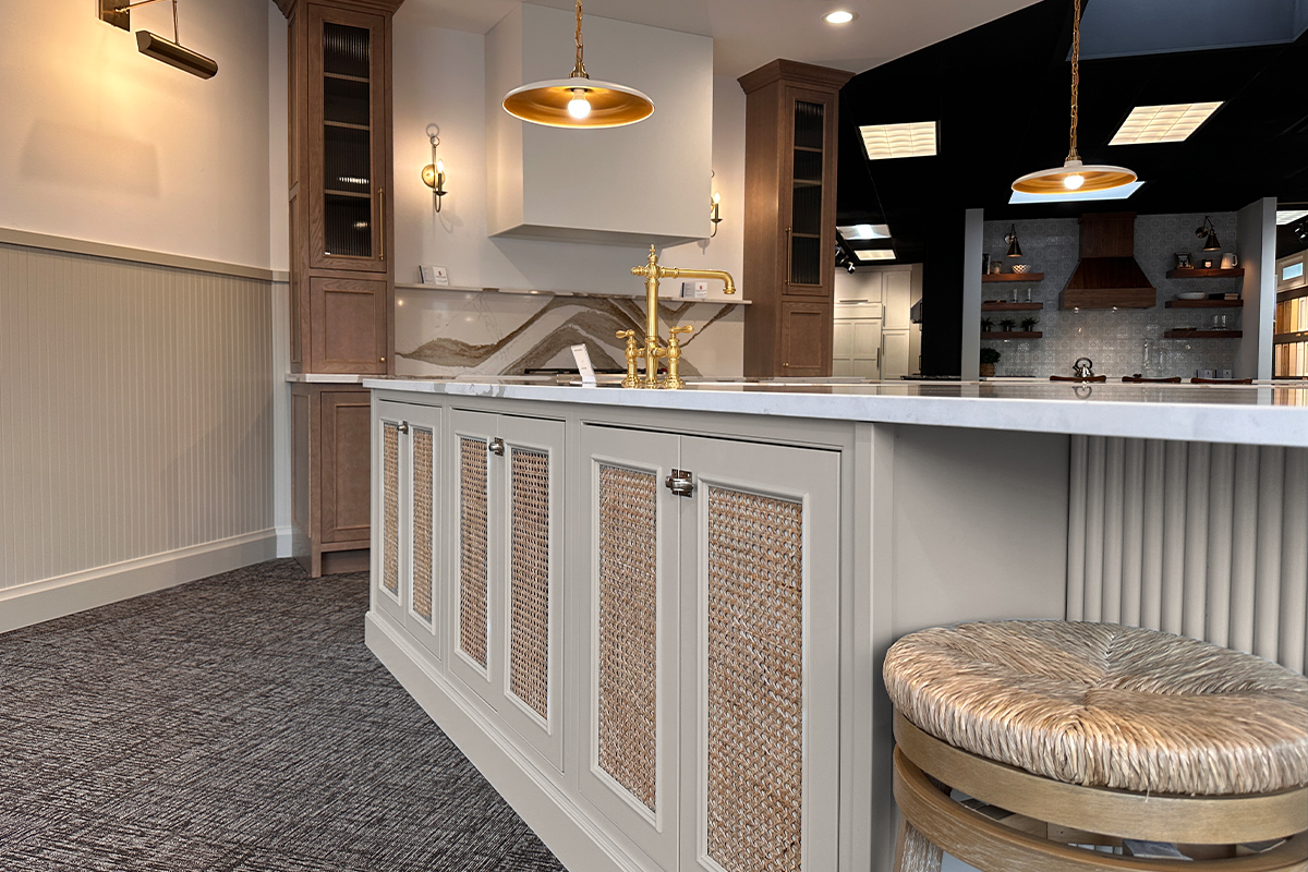 Painted kitchen island and hood with stained cabinets