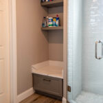 Painted bathroom bench seat and floating shelves