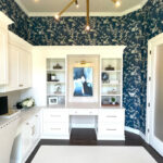 Painted white office cabinets.