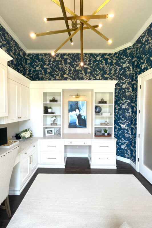 Painted white office cabinets.