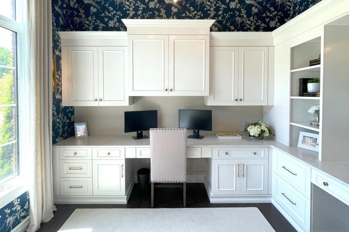 Painted white office cabinets.