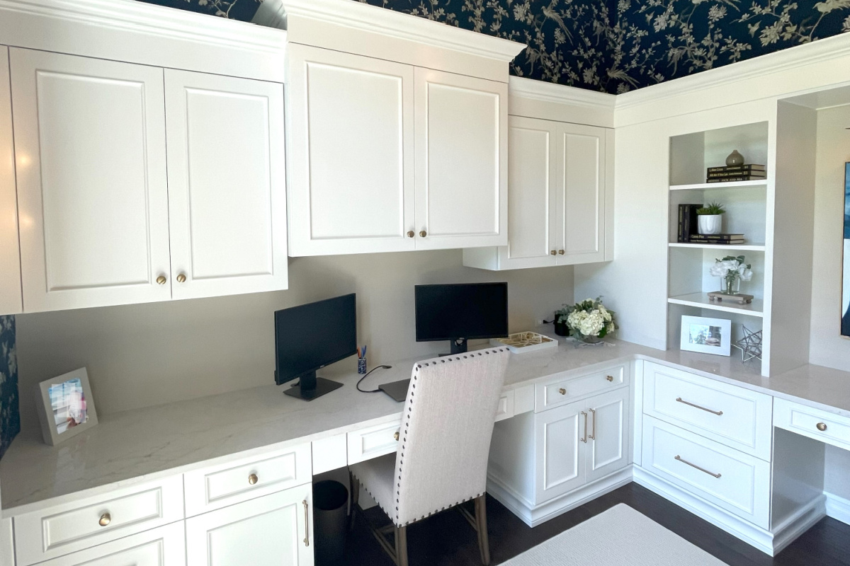 Painted white office cabinets.