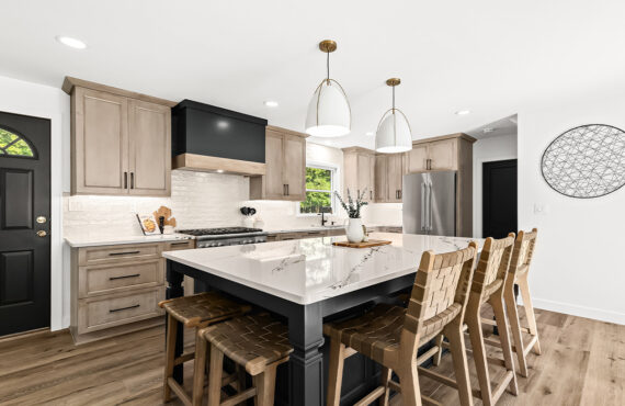 Stained kitchen cabinets with painted island