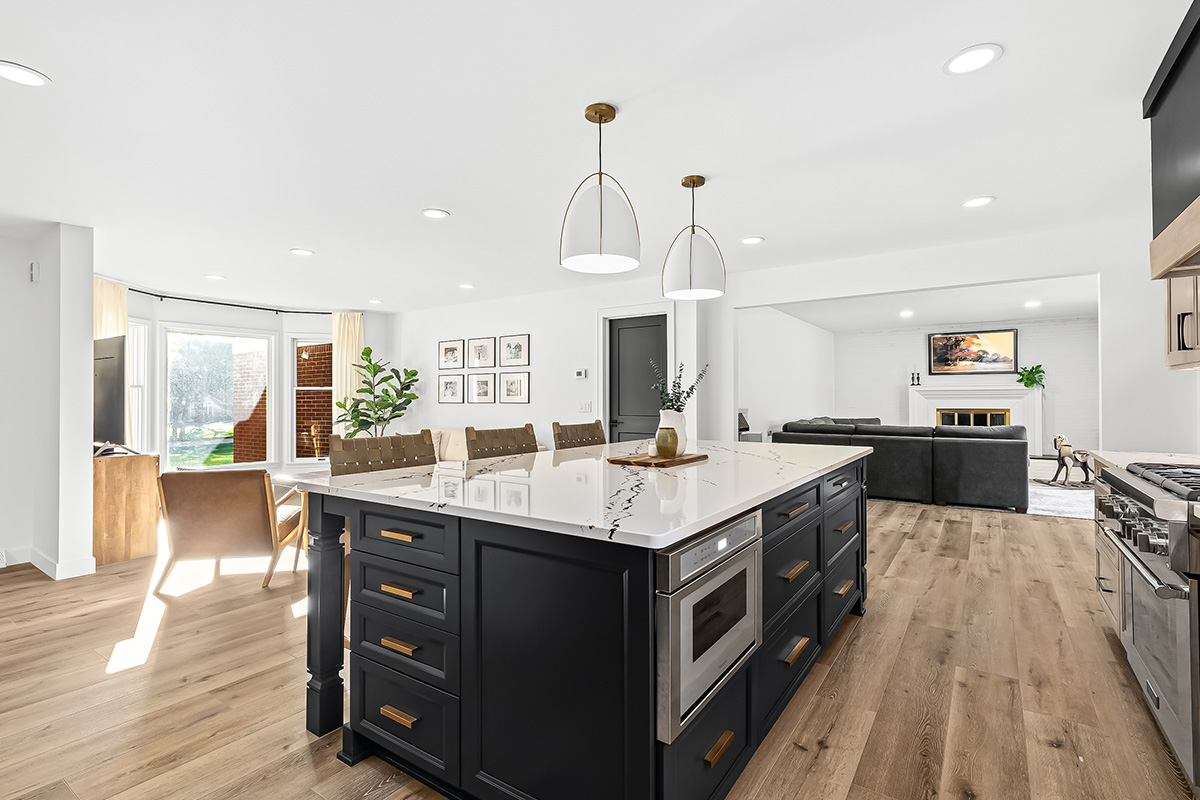 Stained kitchen cabinets with painted island