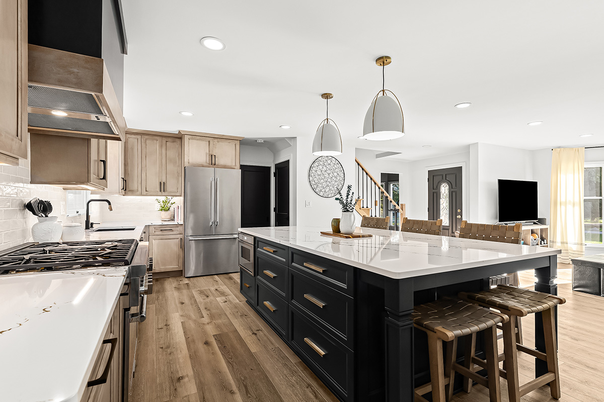 Stained kitchen cabinets with painted island