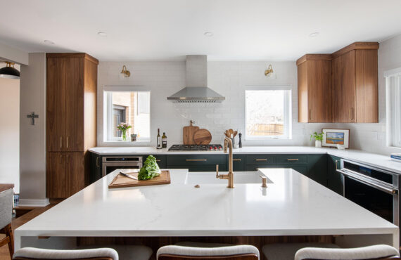 Stained and painted open floor plan kitchen with island