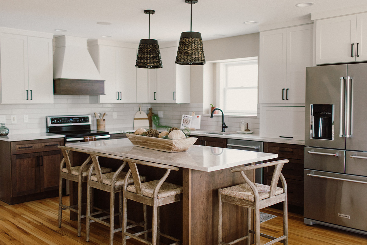 Painted and stained kitchen cabinets, including island.