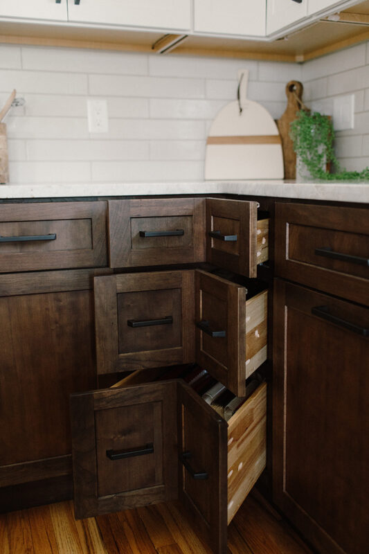 3 drawer corner base with drawers opened.