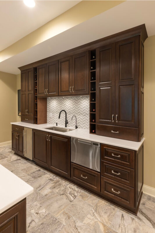 Stained home bar with sink and appliances