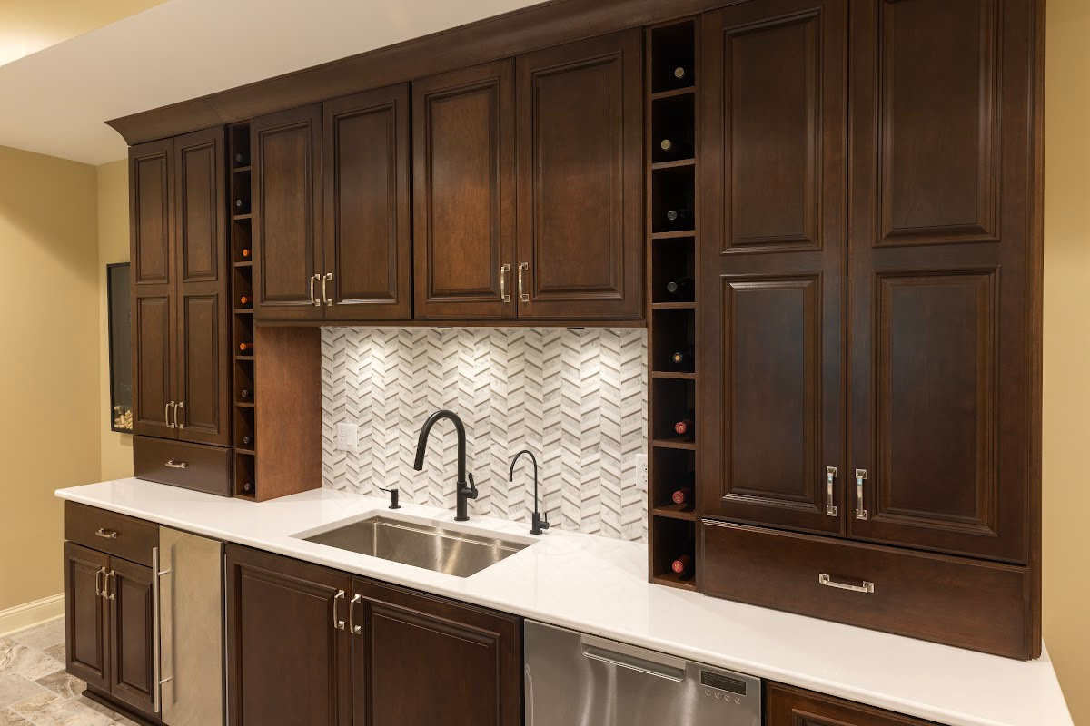 Stained home bar with sink and appliances