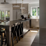 Painted kitchen perimeter cabinets with stained island cabinets