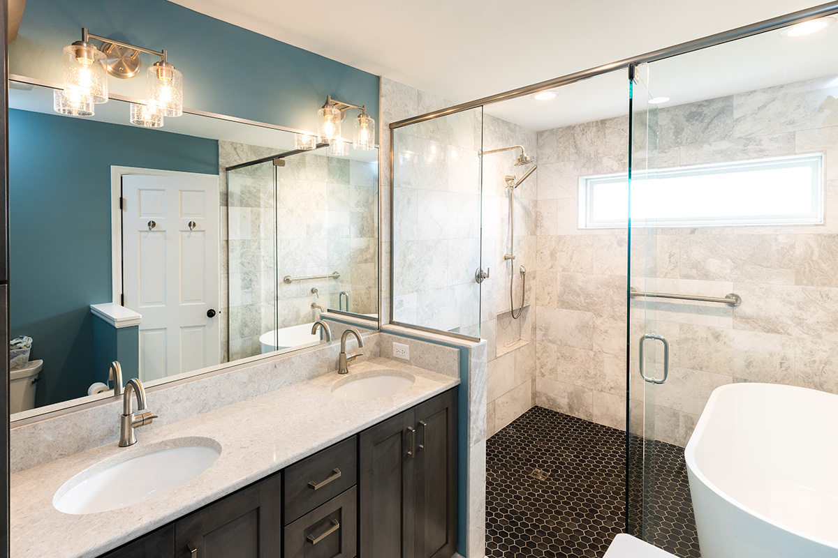 Bathroom with vanity, mirror and glass shower