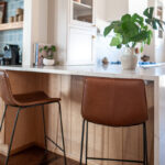 Small painted kitchen with stained accent cabinets