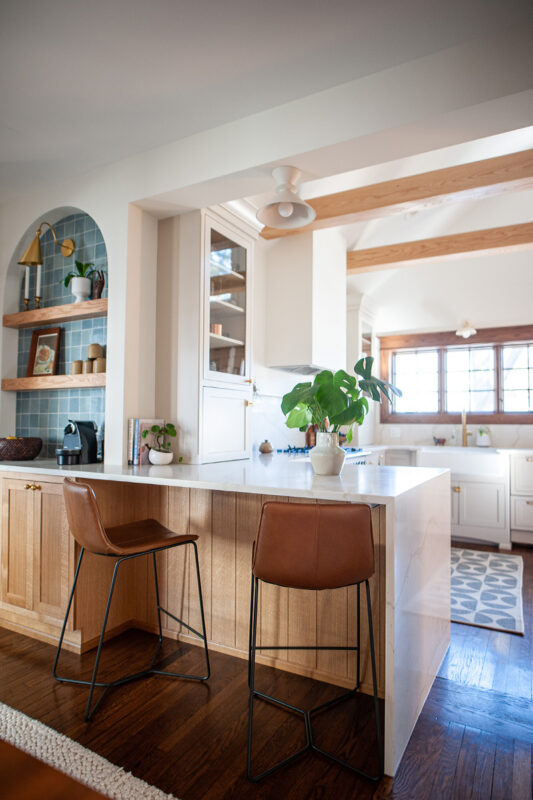 Small painted kitchen with stained accent cabinets