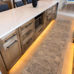 Kitchen island with undercabinet lighting.