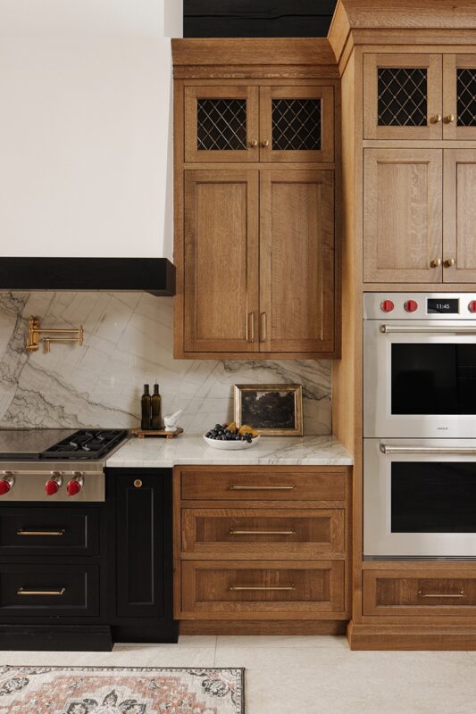 stained cabinets with double oven