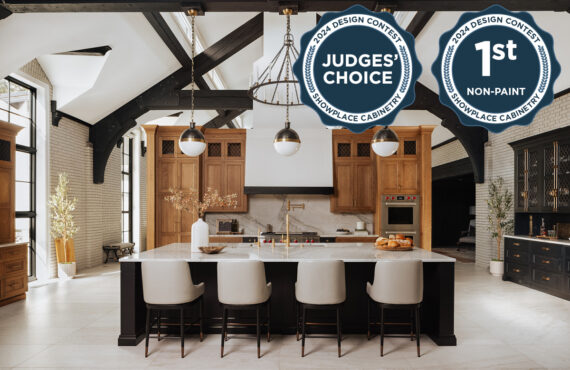 Large open kitchen space with wood beams and stained and painted cabinets