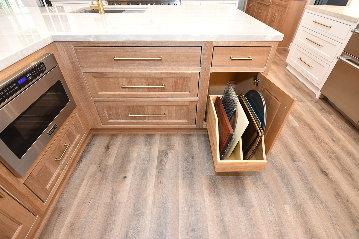 stained cabinets with pullout storage