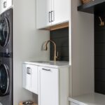 White painted laundry room cabinets