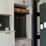 White painted laundry room cabinets