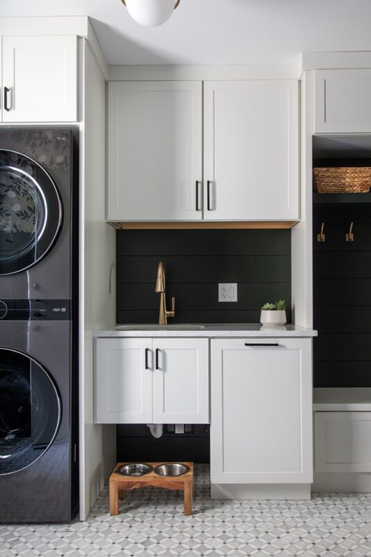 White painted laundry room cabinets