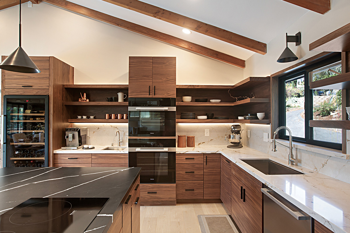 Walnut natural contemporary kitchen with vaulted ceiling and wood beams