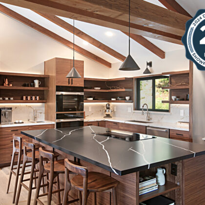 Walnut natural contemporary kitchen with vaulted ceiling and wood beams