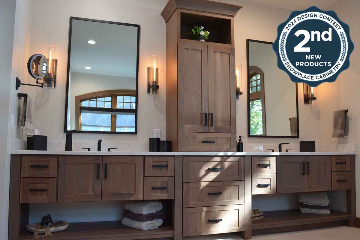 Stained bathroom vanity cabinets with open shelf on the bottom and a countertop wall cabinet splitting 2 sinks