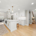 White painted kitchen with island seating