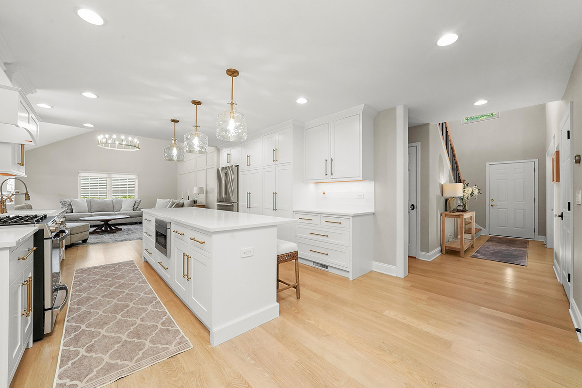 White painted kitchen with island seating