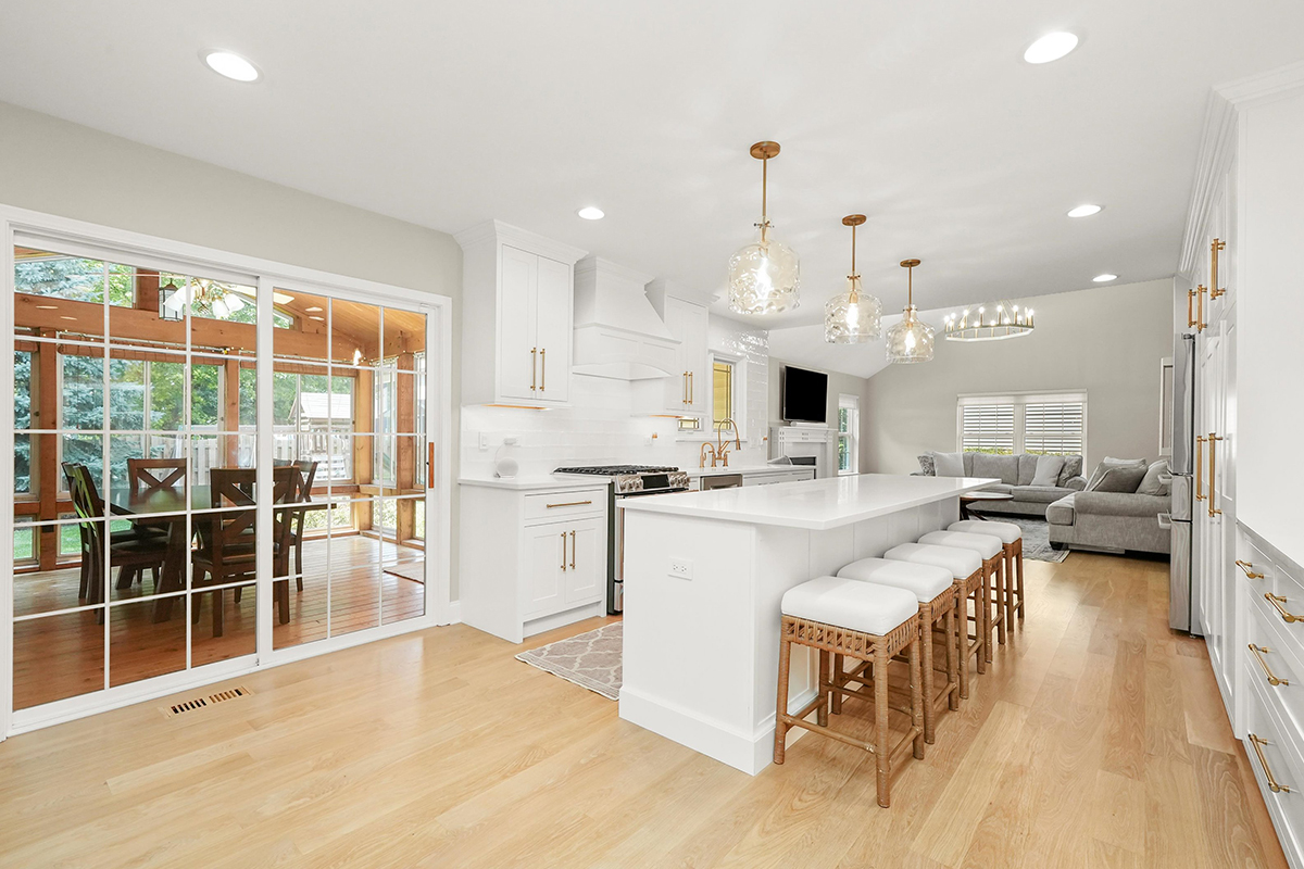 White painted kitchen with island seating