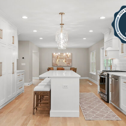 White painted kitchen with island seating