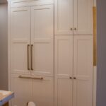 Soft cream painted kitchen cabinets