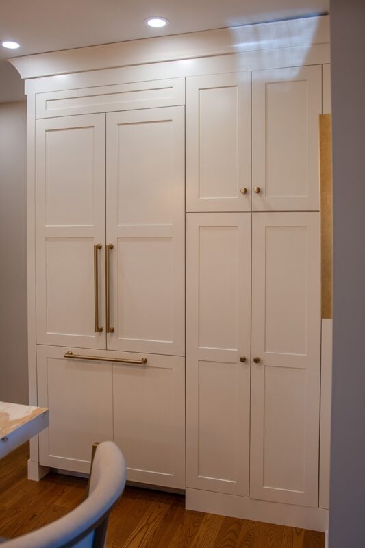 Soft cream painted kitchen cabinets