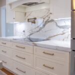 Soft cream painted kitchen cabinets