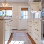 Soft cream painted kitchen cabinets