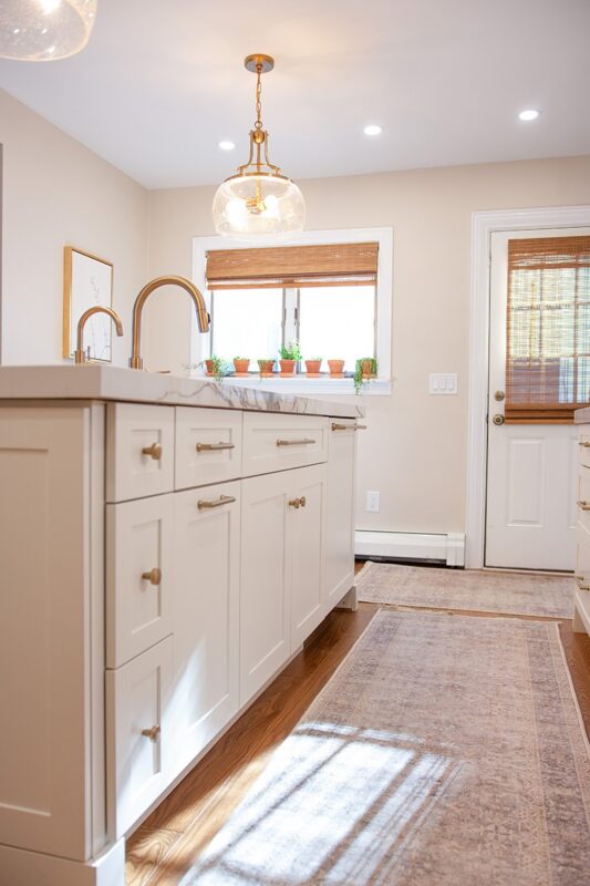 Soft cream painted kitchen cabinets