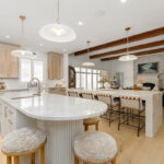 Kitchen and double islands with stained and painted cabinets