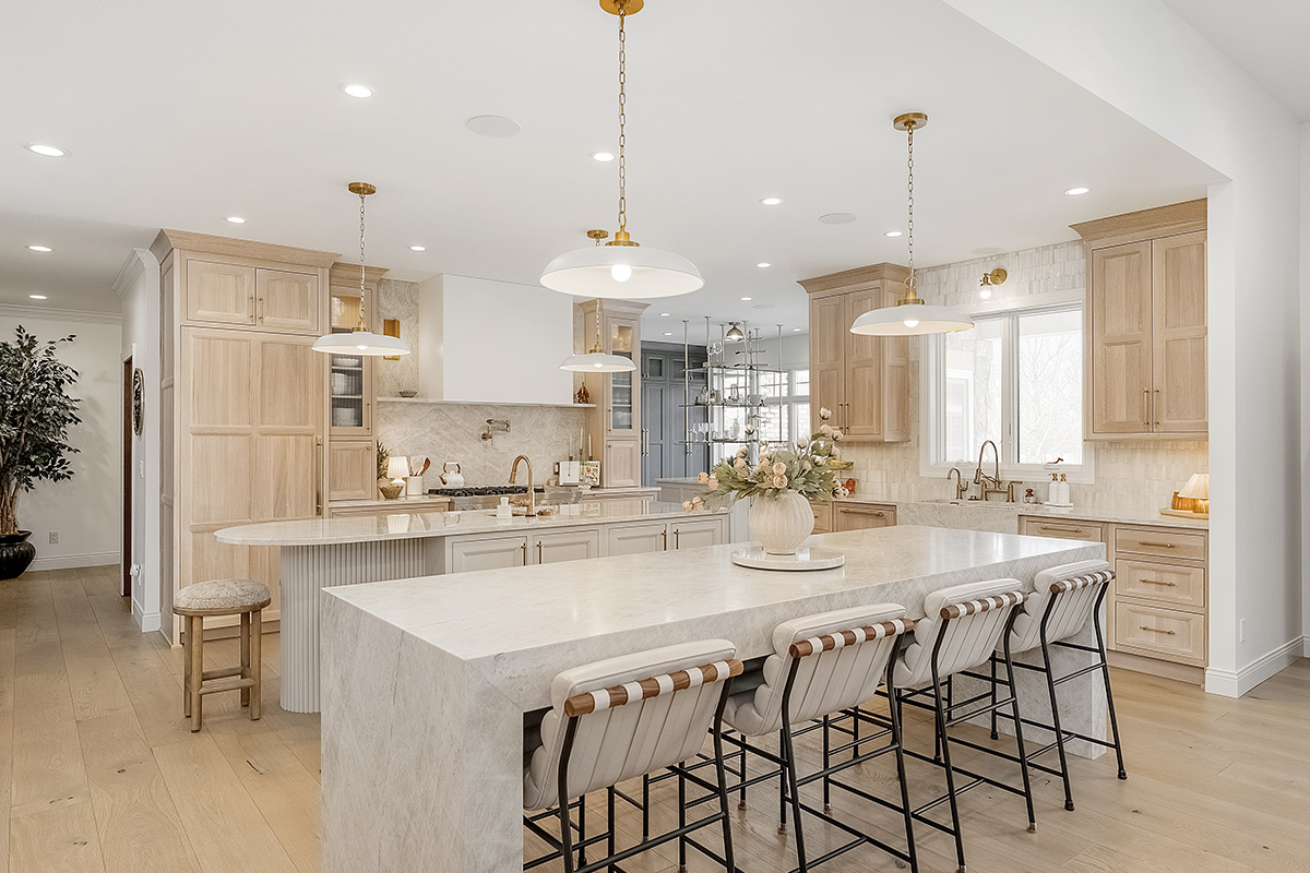 Kitchen and double islands with stained and painted cabinets