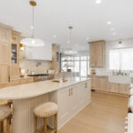 Kitchen and double islands with stained and painted cabinets