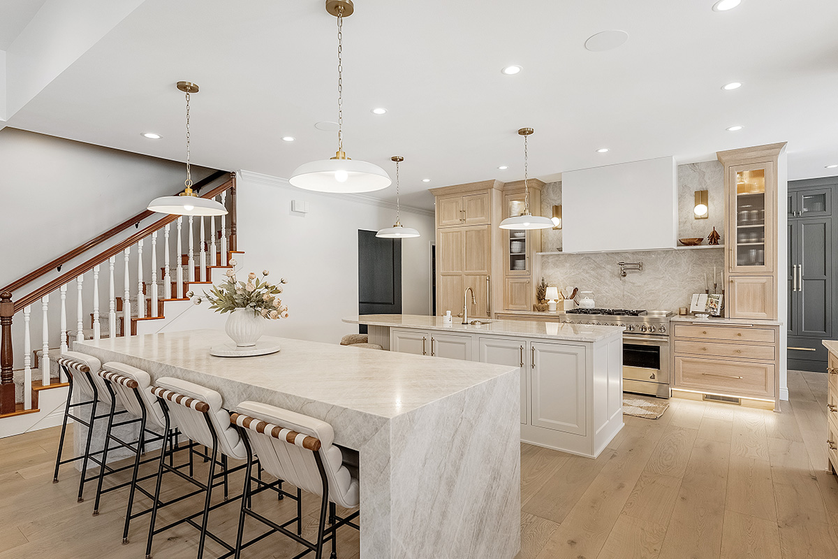 Kitchen and double islands with stained and painted cabinets