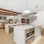 Kitchen and double islands with stained and painted cabinets