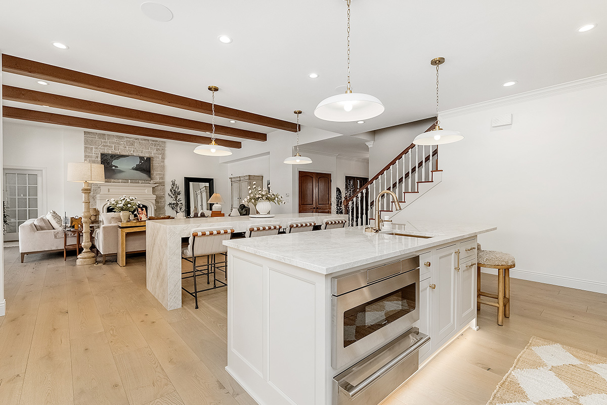 Kitchen and double islands with stained and painted cabinets